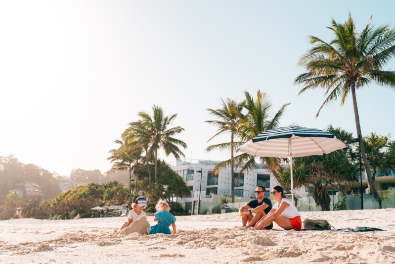 Things to do in Noosa - Family Playing in the Sand on Main Beach